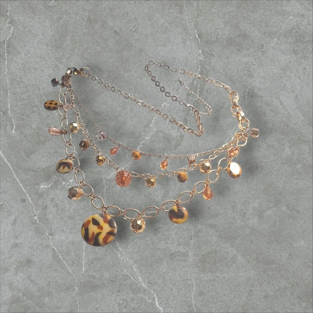 Gold and Brown Nature-Inspired Necklace with Crystal Accents